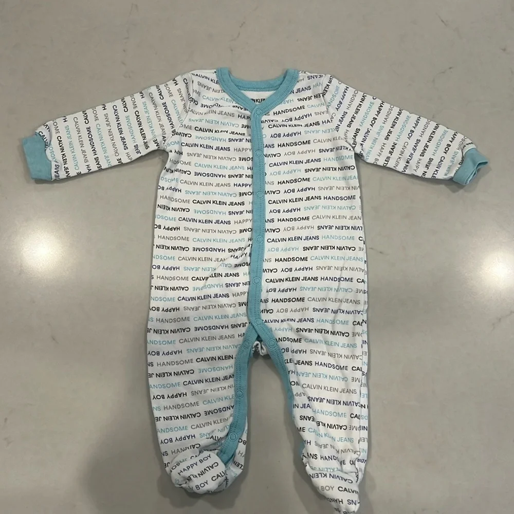Calvin Klein Jeans baby footed coverall, never worn, size 3/6 months.